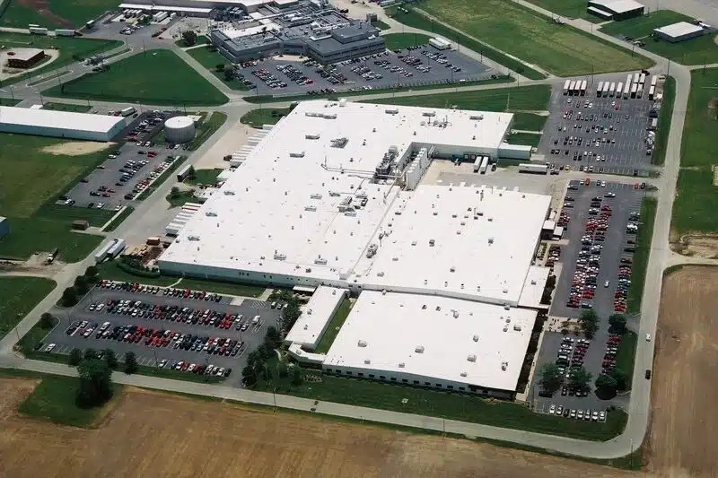 Manufacturing facility with a TPO or PVC roofing system