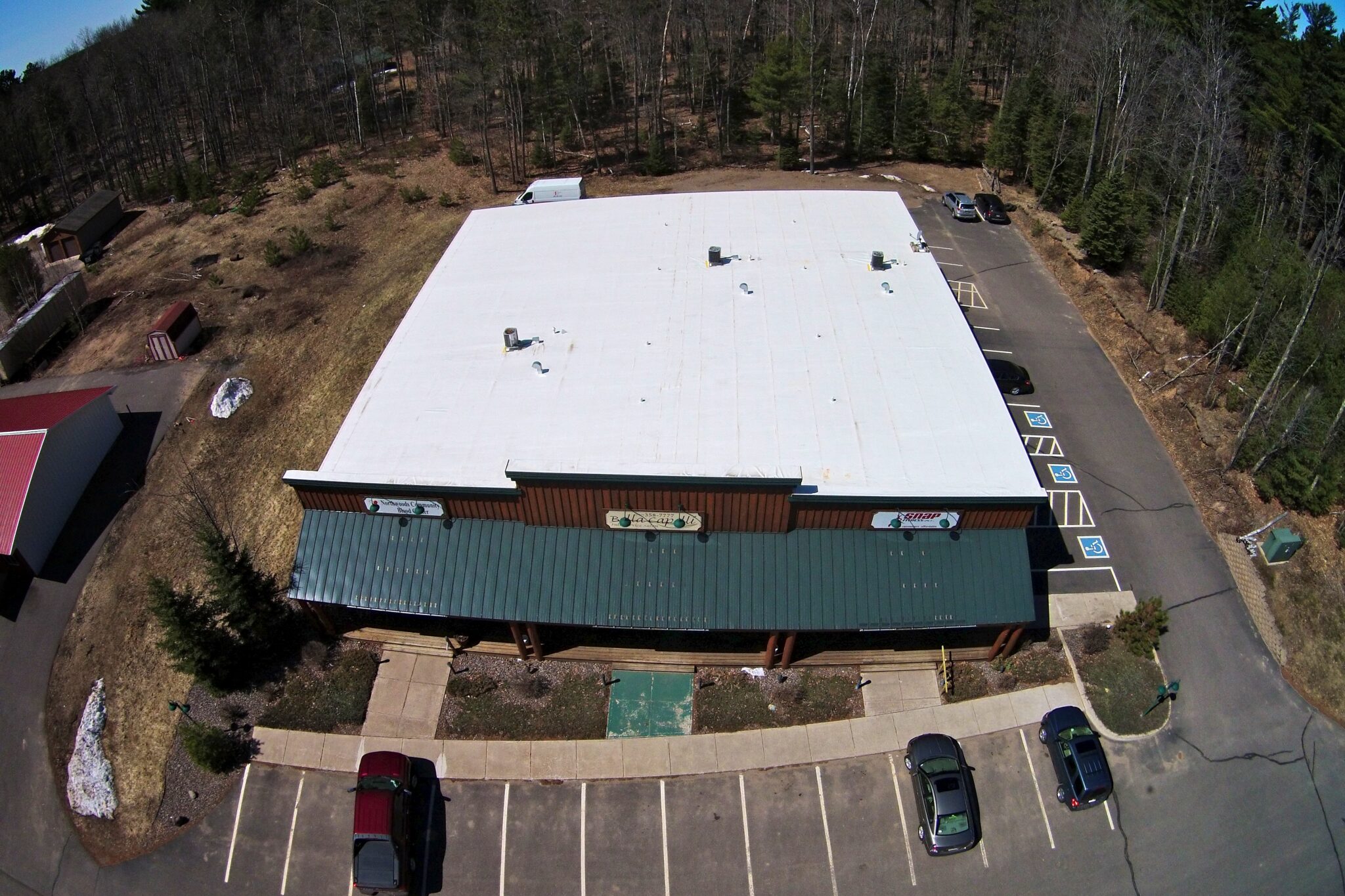 Warehouse and distribution center with a completed flat roof